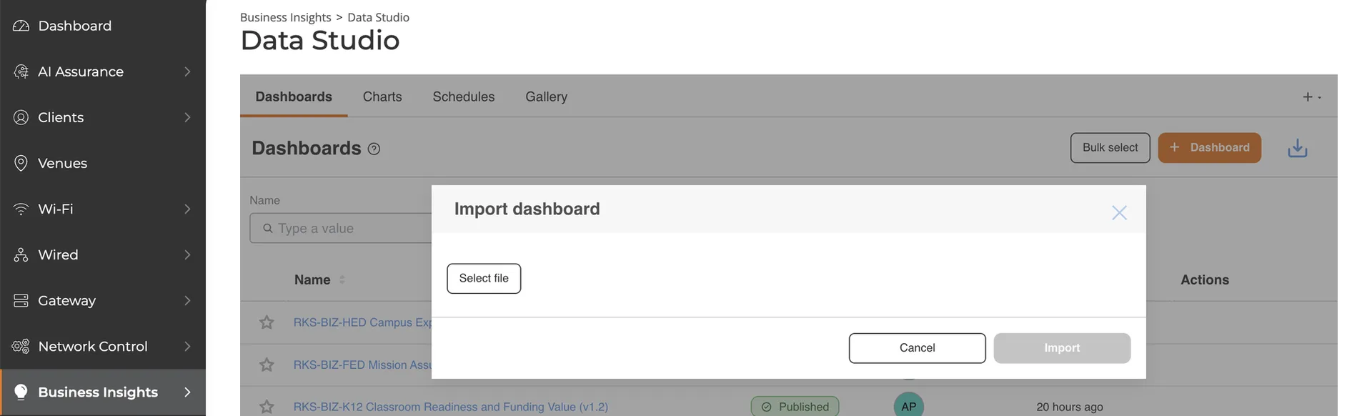 The Import dashboard dialog open over the dashboards list, with a Select file button and Cancel and Import buttons.